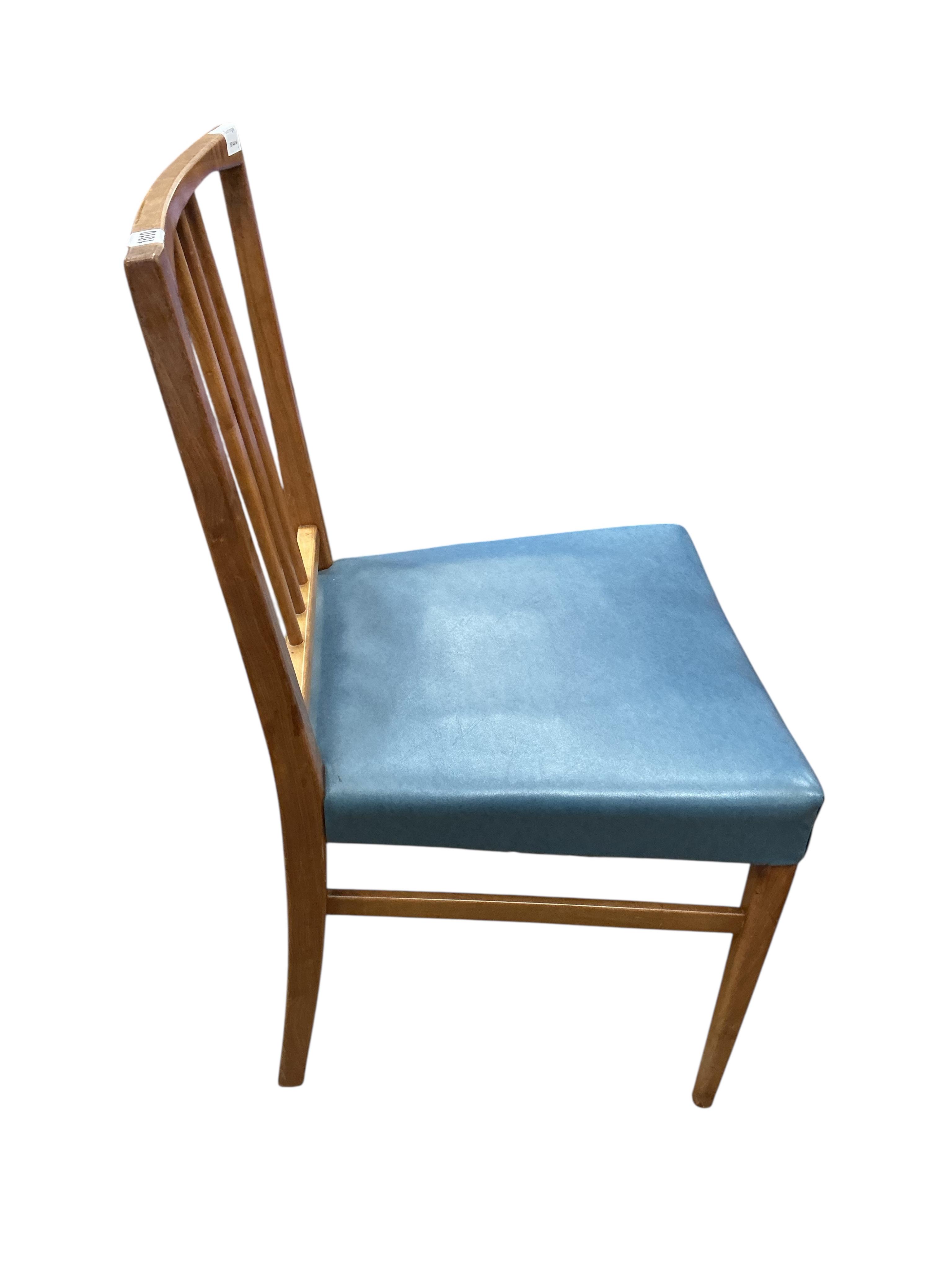 A set of four Gordon Russell mid century teak dining chairs, width 46cm, depth 44cm, height 85cm